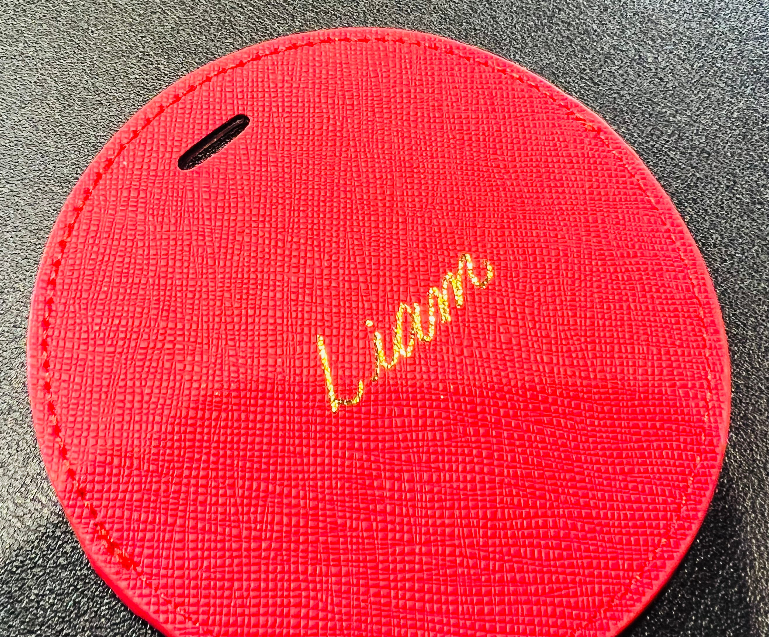 Red circular with gold hot foiling