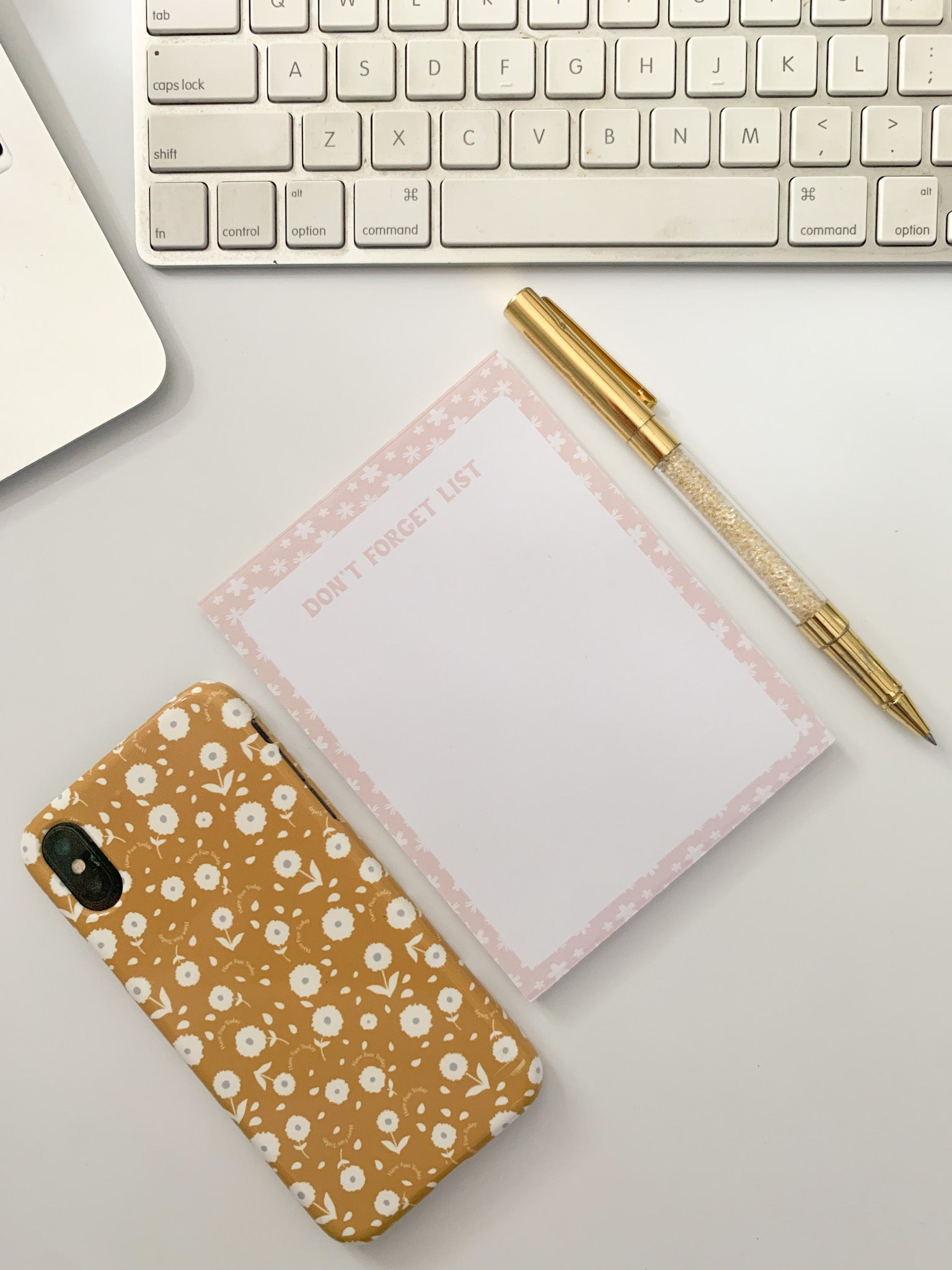 small cute pink notepad with floral border