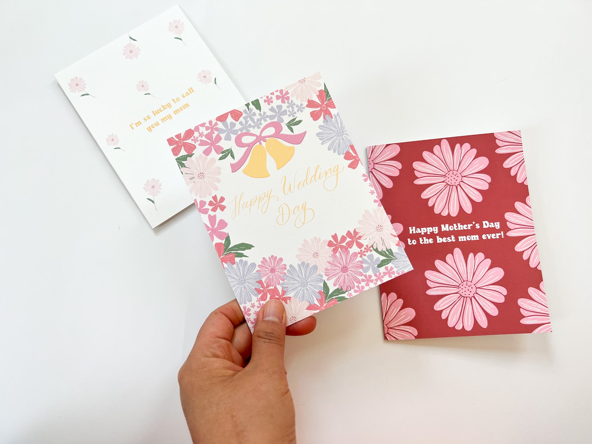 cute pretty wedding card with flowers and calligraphy