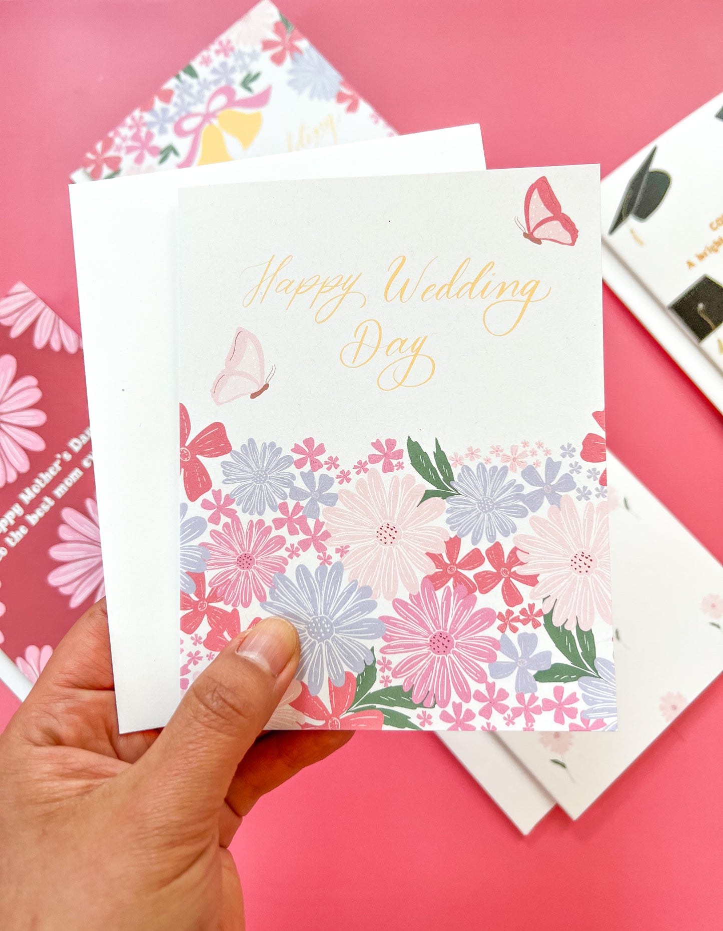 adorable wedding card with pink flowers and butterflies